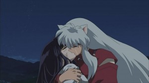Inuyasha embraces Kikyo for the final time.